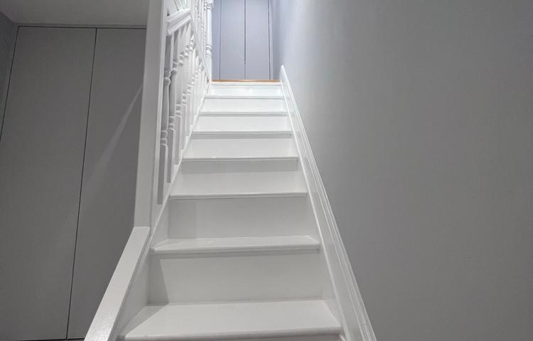 Refurbished staircase and access to the converted cellar in Clapham