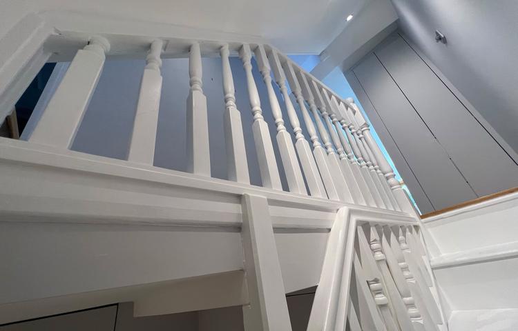 Refurbished staircase and access to the converted cellar in Clapham