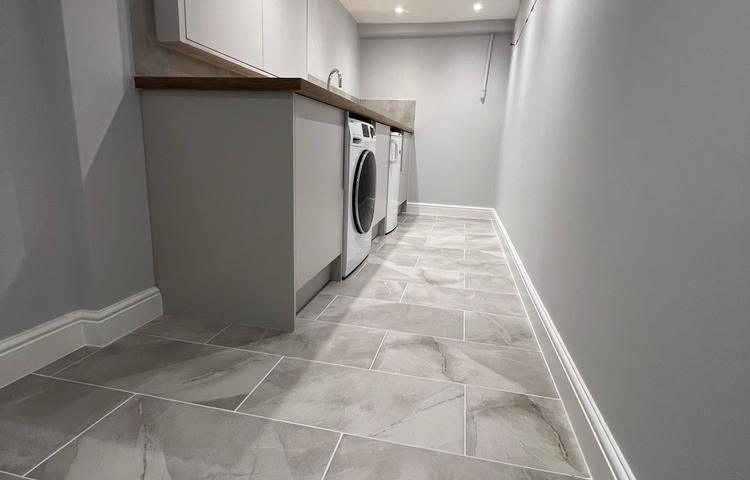 Completed converted cellar interior with fitted cupboards in Clapham