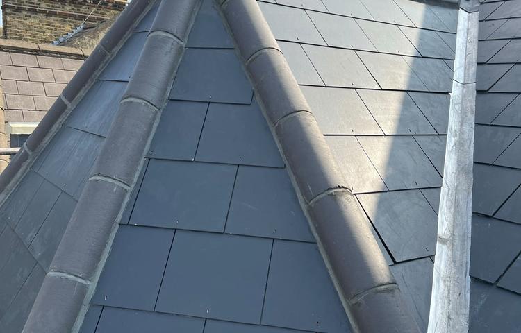 New roof covering and roof details at the Clapham property