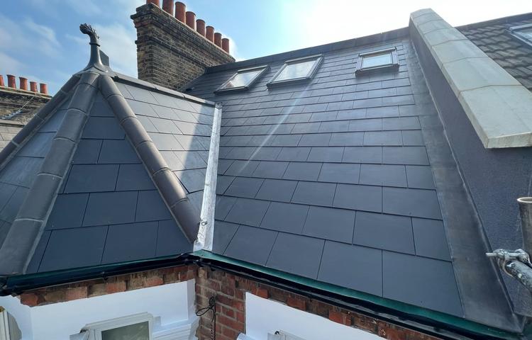 New roof covering and roof details at the Clapham property