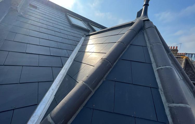 New roof covering and roof details at the Clapham property