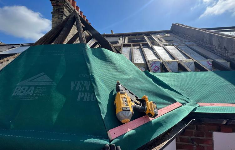 Roof replacement and construction work on the Clapham property
