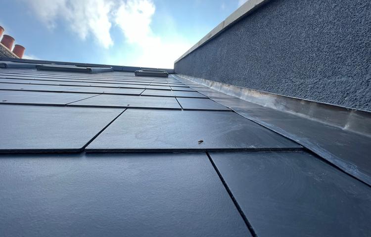 New roof covering and roof details at the Clapham property
