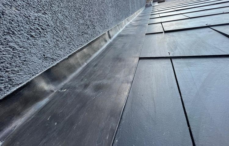 New roof covering and roof details at the Clapham property