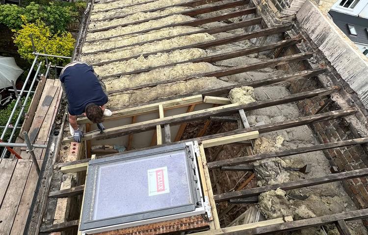 Roof replacement and construction work on the Clapham property
