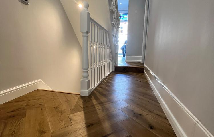 New wood flooring and refurbished hallway in Clapham