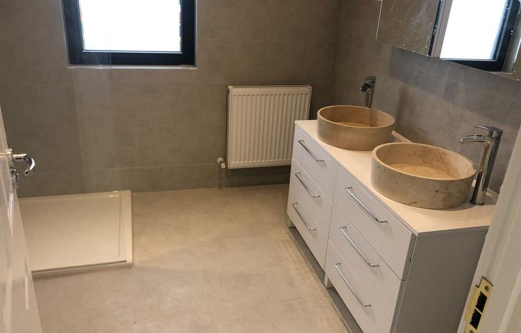 Double-basin vanity unit in a renovated bathroom in Lewisham