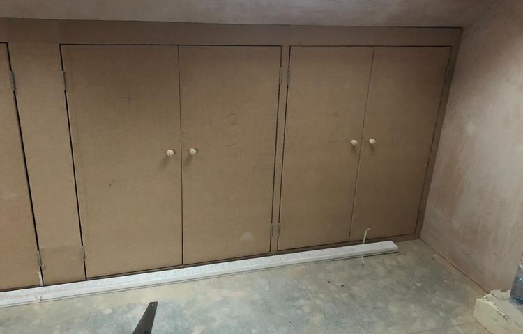 Fitted storage units during refurbishment in Lewisham