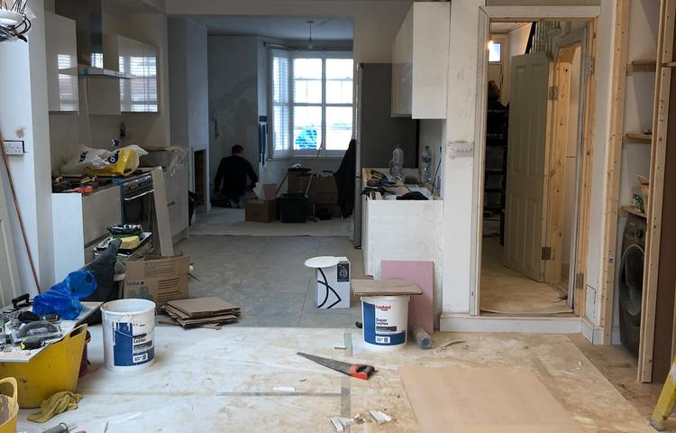 Open-plan kitchen during refurbishment in Lewisham