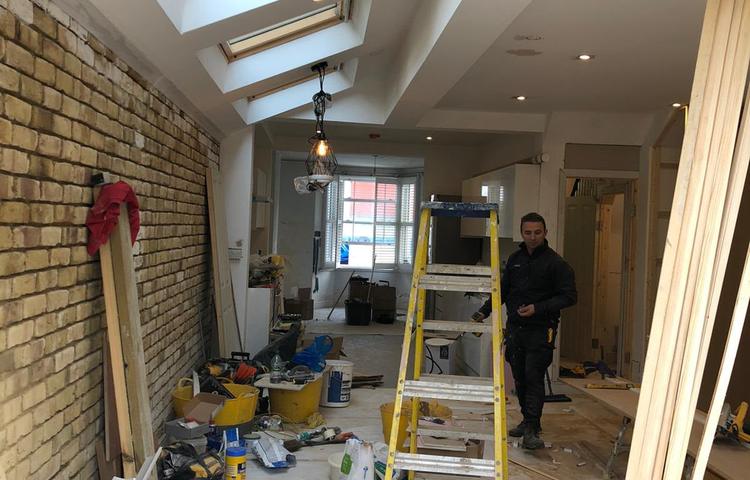 Kitchen renovation with rooflights and exposed brickwork in Lewisham