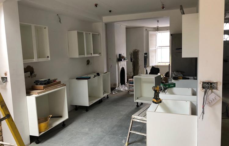 Kitchen cabinets installed before finishing in Lewisham