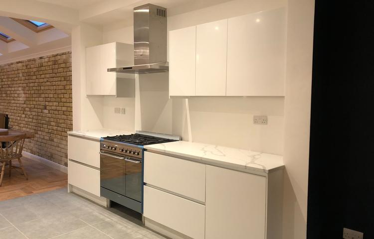 Fitted white kitchen in the extended living space in Lewisham