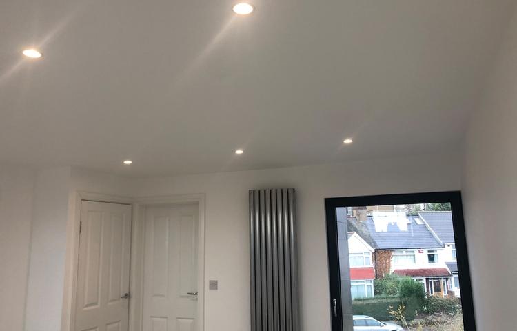Freshly decorated room with recessed spotlights in Lewisham