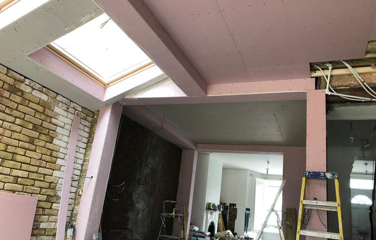 Rooflights and exposed brickwork during building work in Lewisham