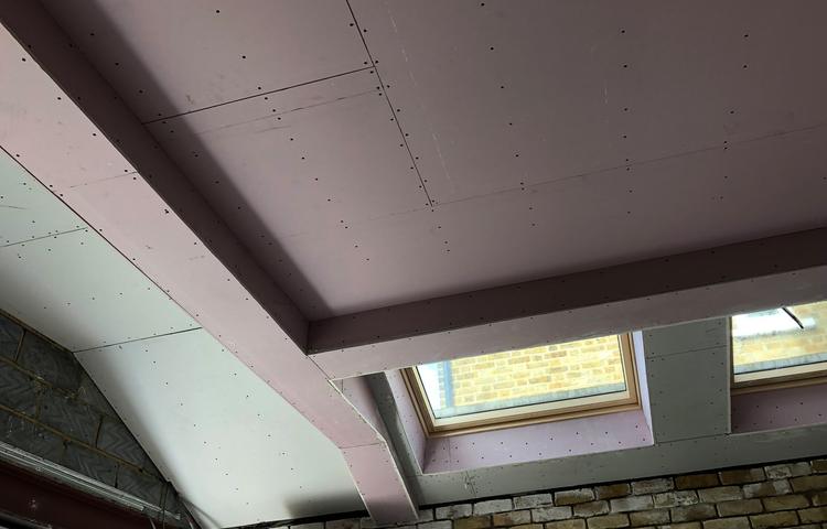 Rooflight openings during ceiling installation in Lewisham